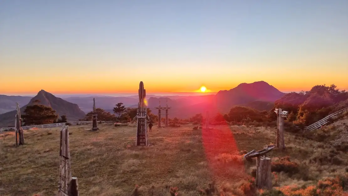 Watch sunset surrounded by nine carved pillars